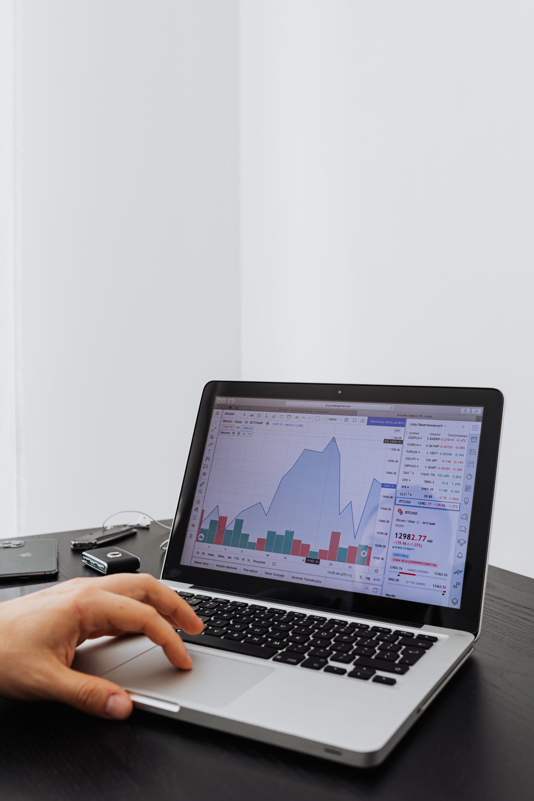 Seller checking sell-through rate and demand figures before buying stock