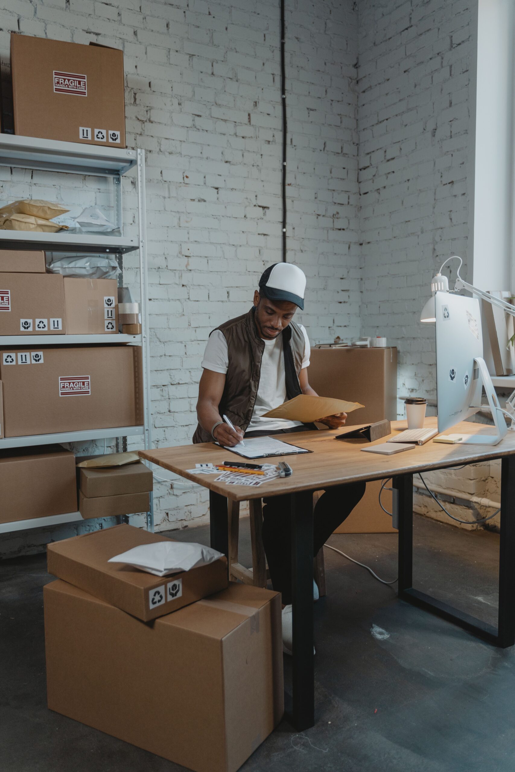 Marketplace orders being packed for dispatch in a warehouse